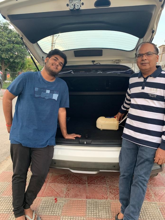 Adarsh Raghav, Student-at Bennett University & Mr.Baljit Singh, VP Operations Head of Brookfield Properties( Right) sanitizing