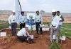 Berry Group’s new center of excellence in Bengaluru Berry Group officials at the plant site in Bengaluru.