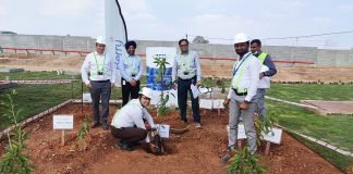 Berry Group’s new center of excellence in Bengaluru Berry Group officials at the plant site in Bengaluru.
