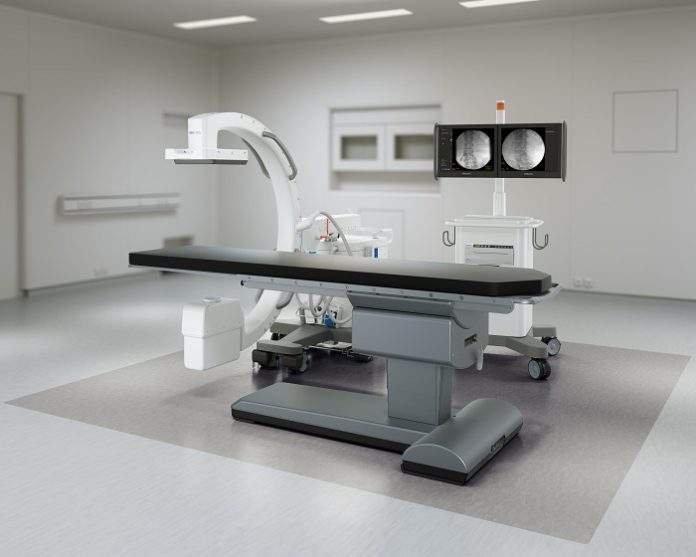 zenition-10-mvs-side-view-with-c-arm-stand-in-ap-with-table-in-or-orthopedic-product-shot.download Philips